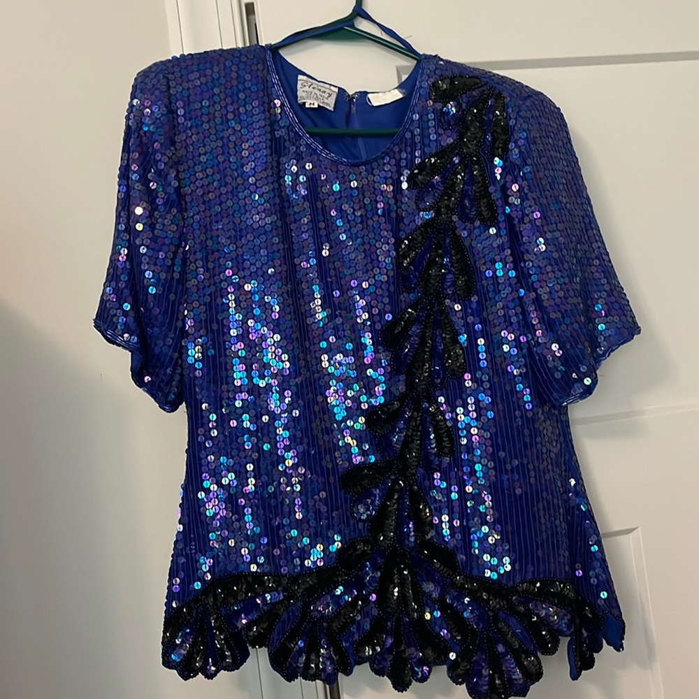 Vintage party top. Would be adorable with a black skirt or black trousers.